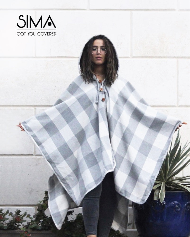 SIMA fashion brand — poncho campaign photography